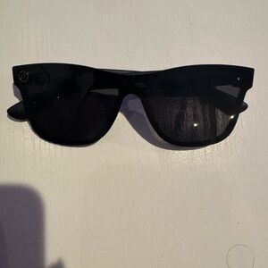 Blenders Sleek Black Rimless Sunglasses